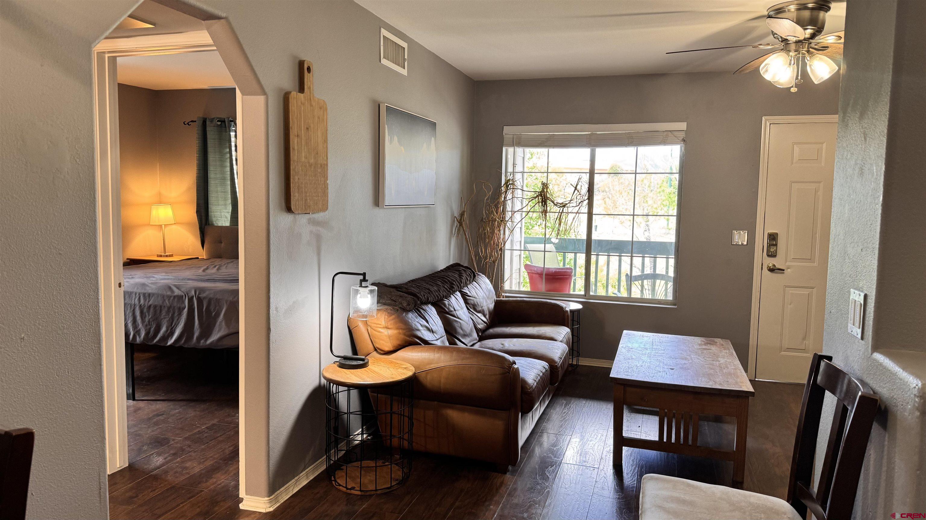 1100 Goeglein Gulch Road, Unit 204 Durango, CO 81301 - Photo 6 of 42 a living room with furniture and a window