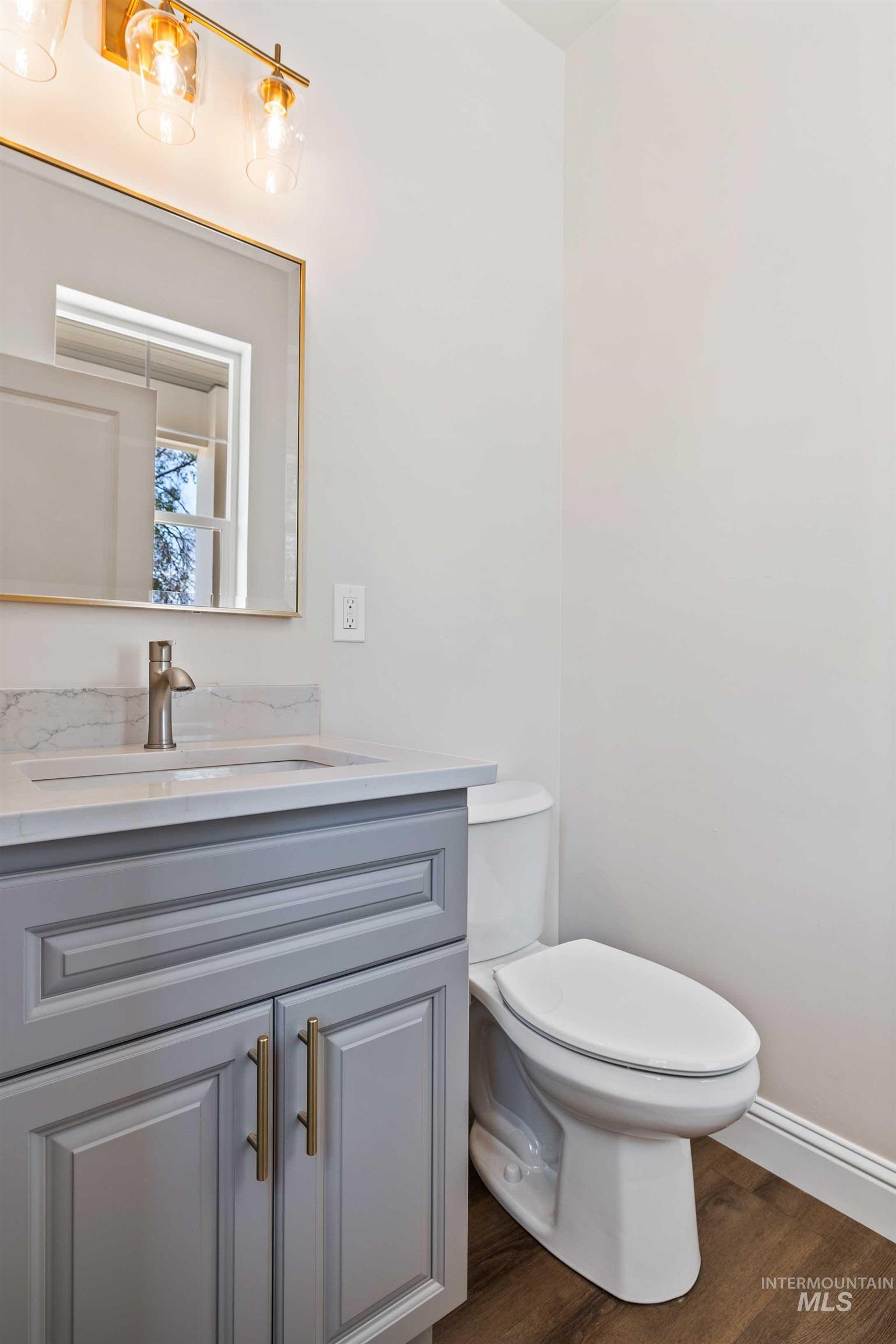 867 Adamite Road Kimberly, ID 83341 - Photo 19 of 24 Bathroom with vanity and wood finished floors