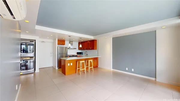 a view of kitchen with cabinets