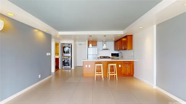 a open kitchen with stainless steel appliances granite countertop a sink and cabinets