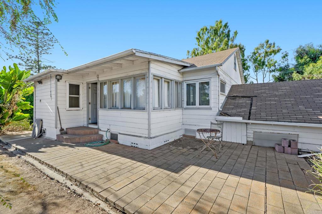 841 Normandy Road Encinitas, CA 92024 - Photo 24 of 38 a front view of a house with a yard