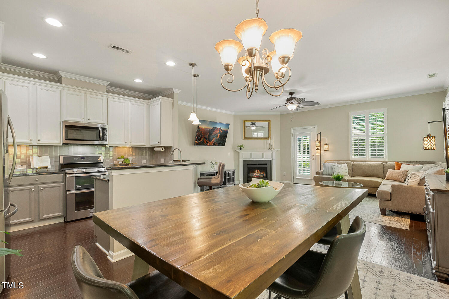 2425 Baslow Drive Apex, NC 27539 - Photo 11 of 48 a large kitchen with a table and chairs