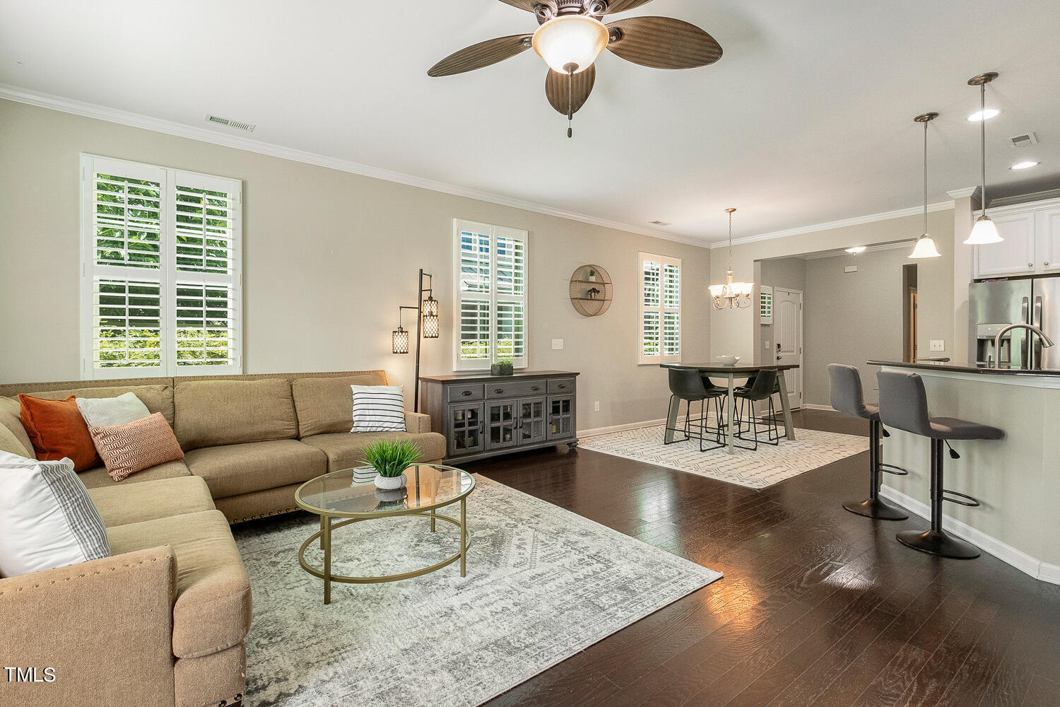 2425 Baslow Drive Apex, NC 27539 - Photo 15 of 48 a living room with furniture and a large window