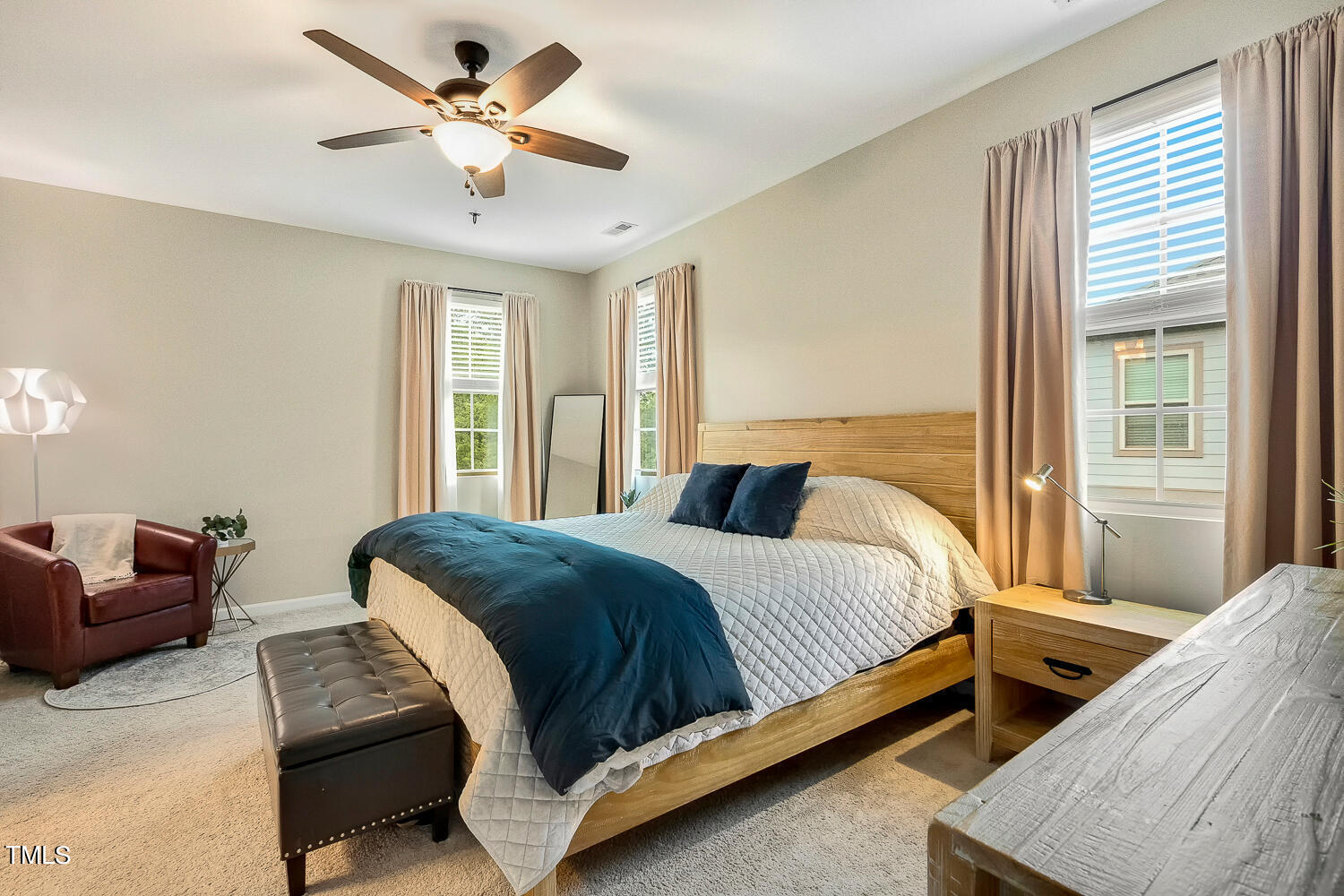 2425 Baslow Drive Apex, NC 27539 - Photo 30 of 48 a bedroom with a bed and window