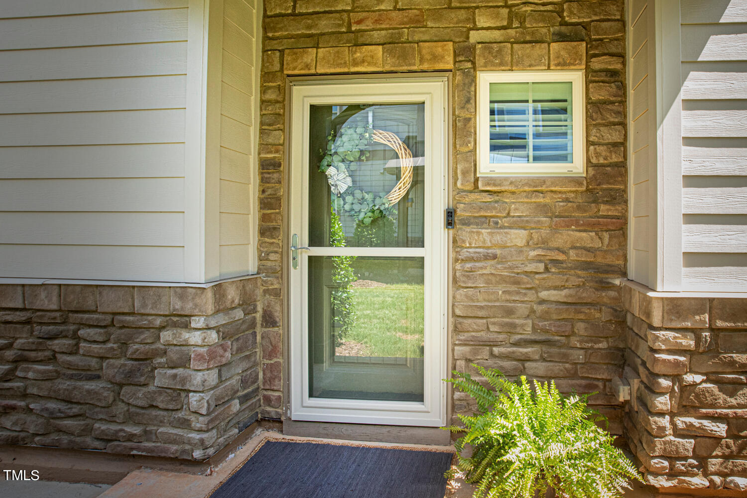 2425 Baslow Drive Apex, NC 27539 - Photo 3 of 48 a view of front door of house with a yard