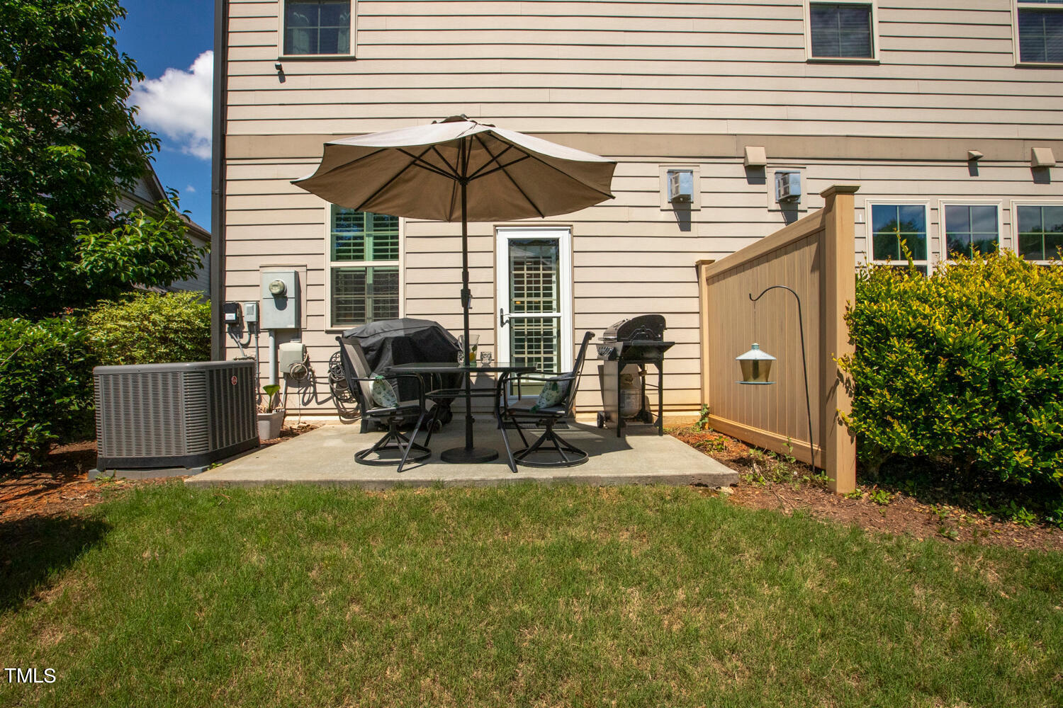 2425 Baslow Drive Apex, NC 27539 - Photo 41 of 48 a view of a house with backyard and sitting area