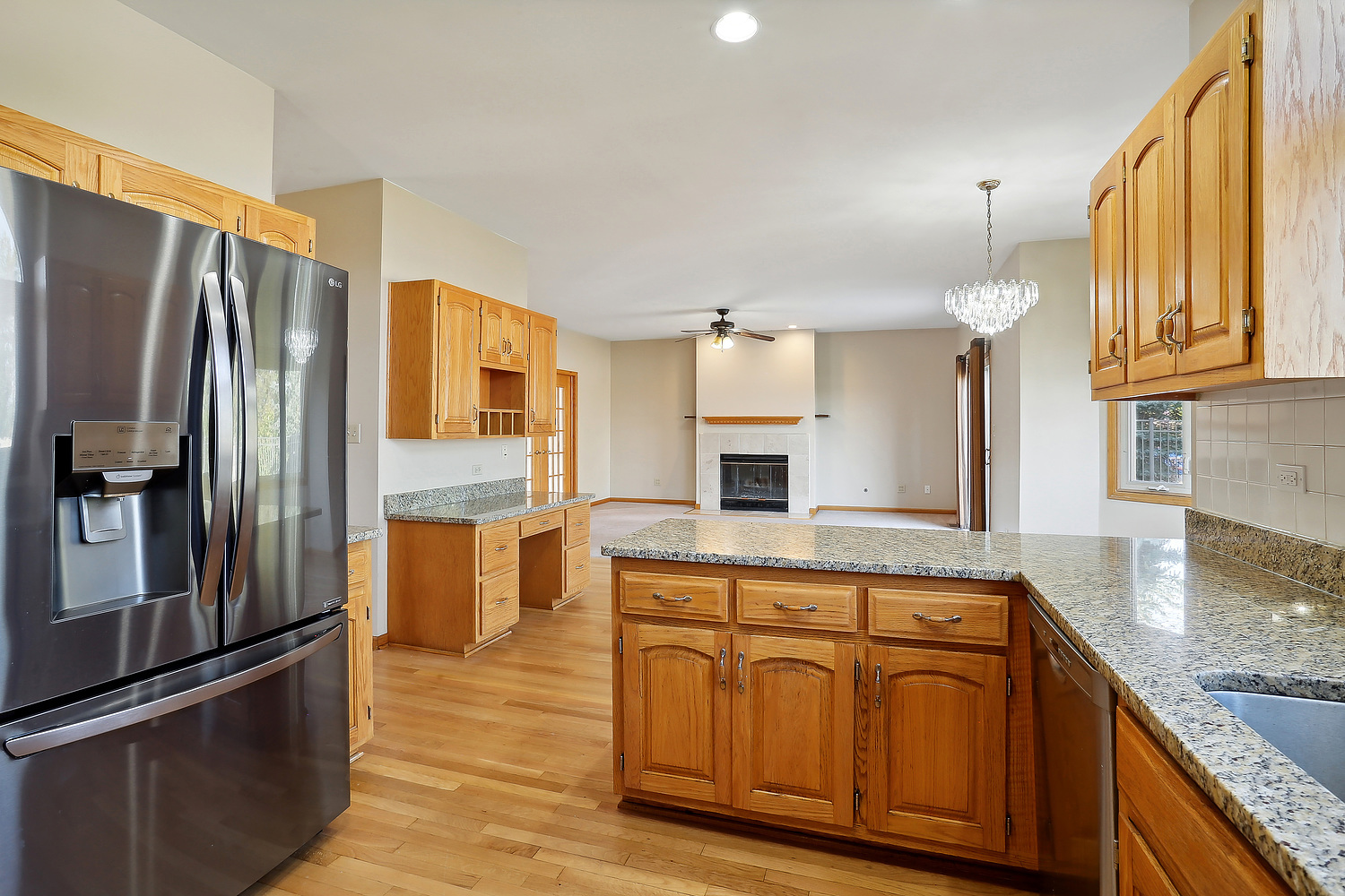 10646 Halligan Way Mokena, IL 60448 - Photo 18 of 28 a kitchen with stainless steel appliances granite countertop a refrigerator a sink and a stove