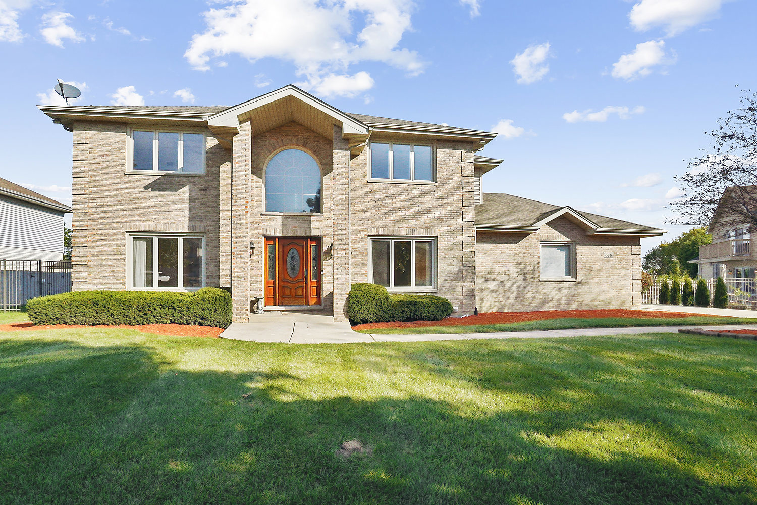 10646 Halligan Way Mokena, IL 60448 - Photo 2 of 28 a front view of a house with a yard