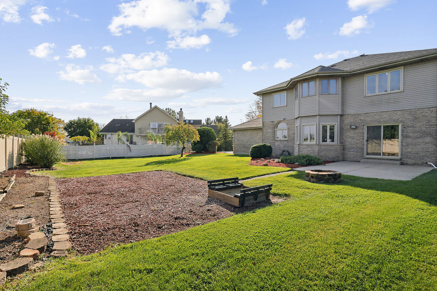 10646 Halligan Way Mokena, IL 60448 - Photo 8 of 28 a swimming pool with outdoor seating and yard