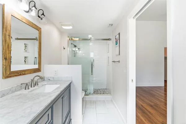 a view of a room that has a window in it