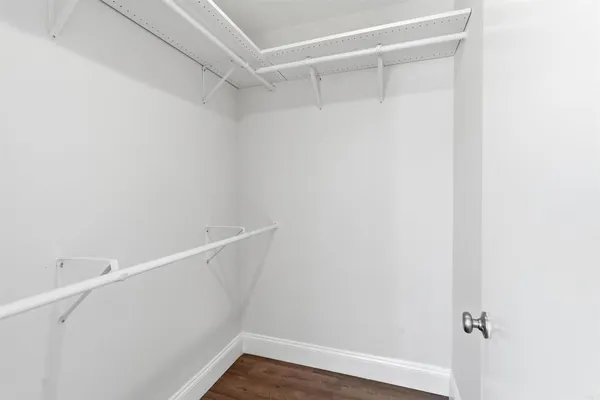 a view of a house with pool and a yard