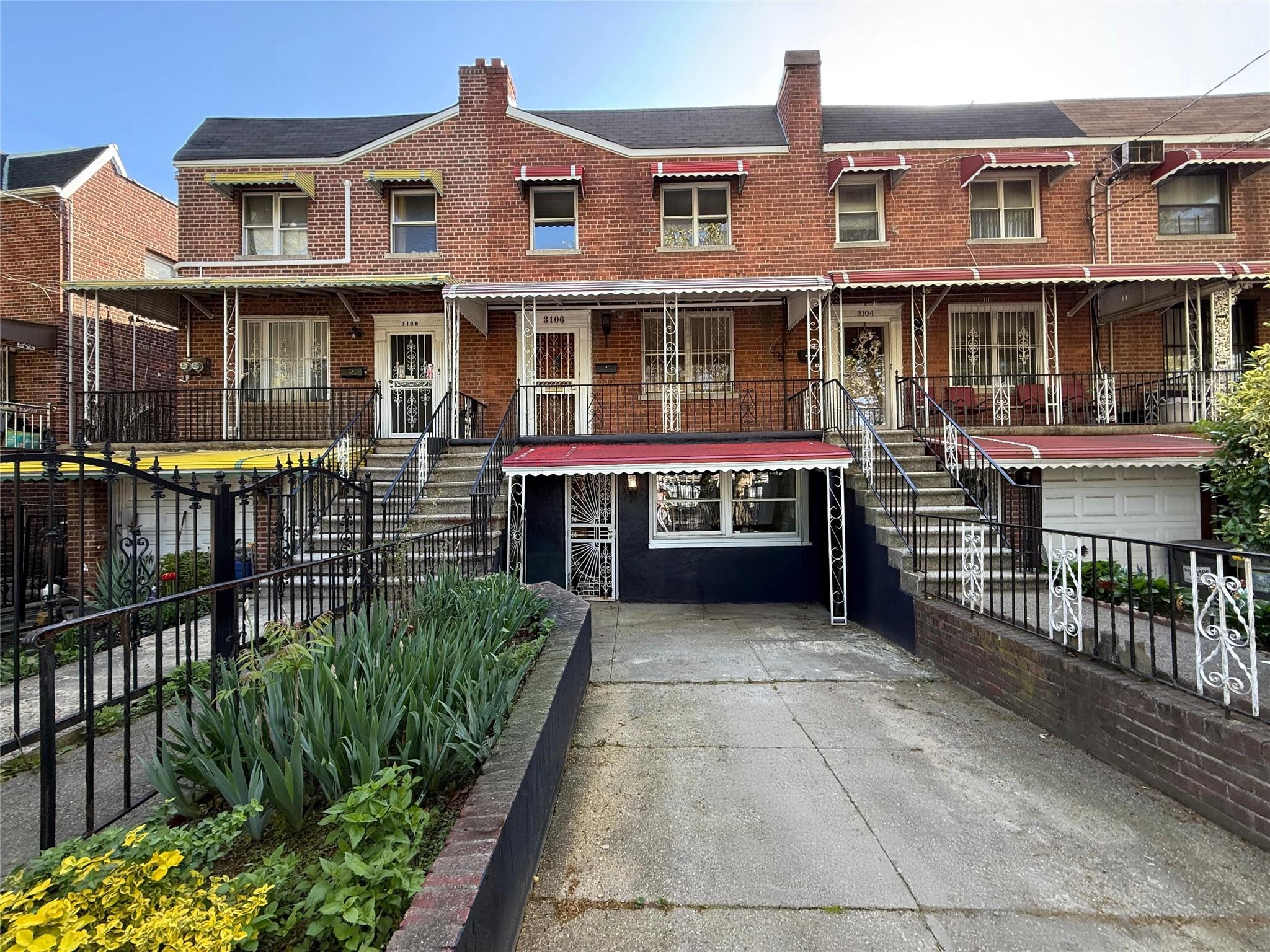 View of front of house featuring brick siding