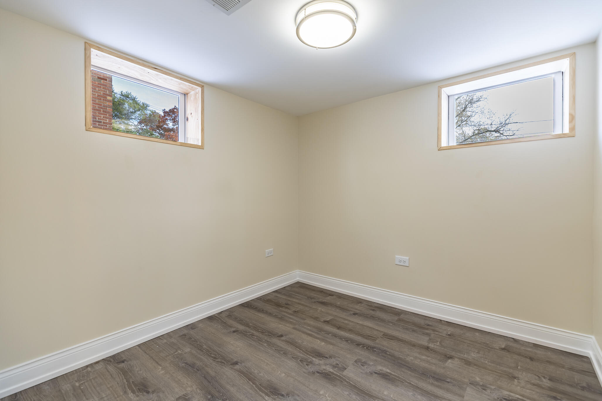 1035 Willard Street Gary, IN 46404 - Photo 20 of 30 a view of an empty room with wooden floor