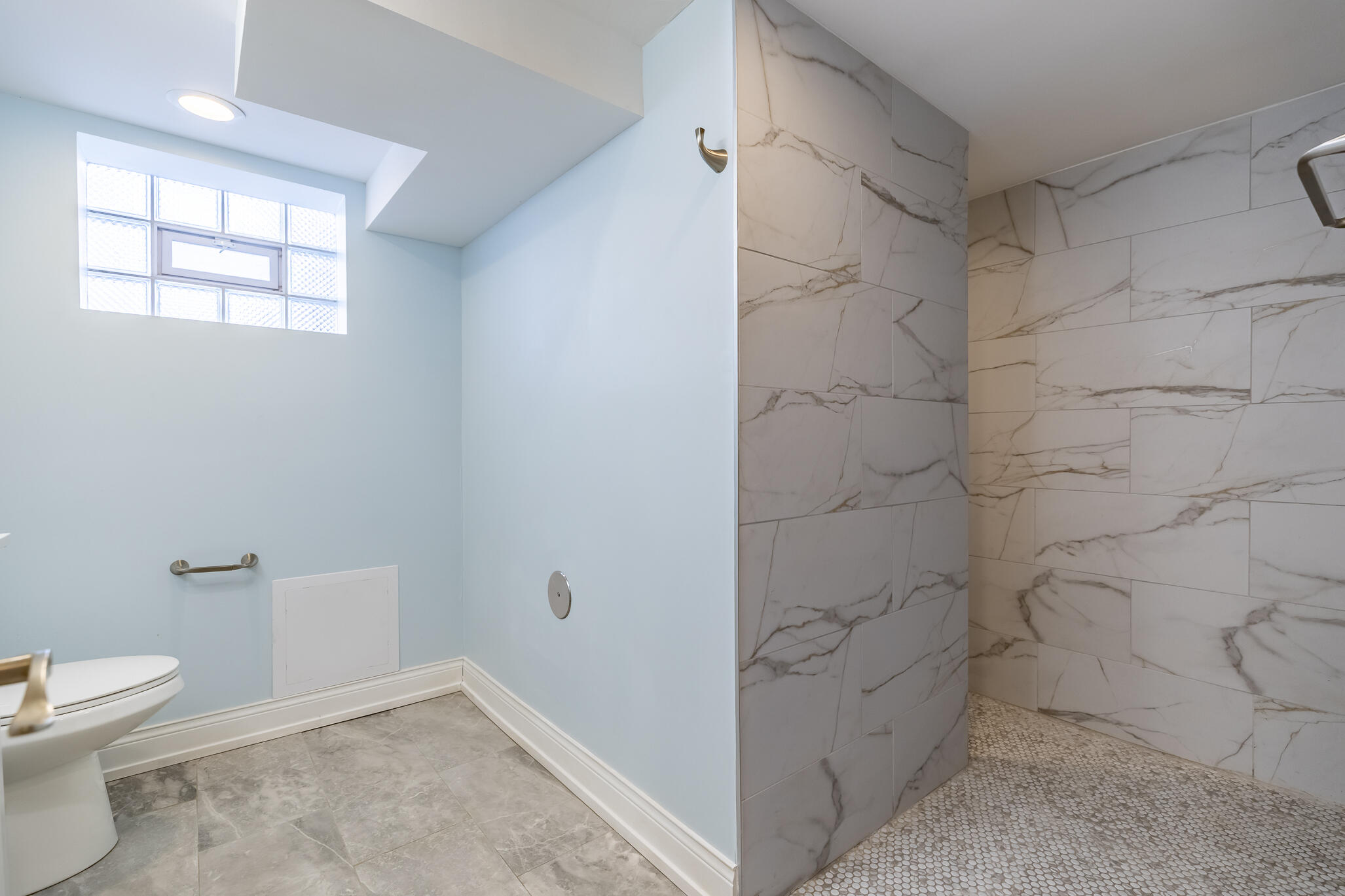 1035 Willard Street Gary, IN 46404 - Photo 25 of 30 a bathroom with a toilet and a shower