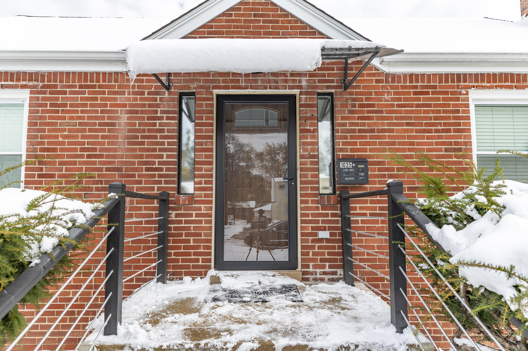 1035 Willard Street Gary, IN 46404 - Photo 3 of 30 a view of a door and brick wall