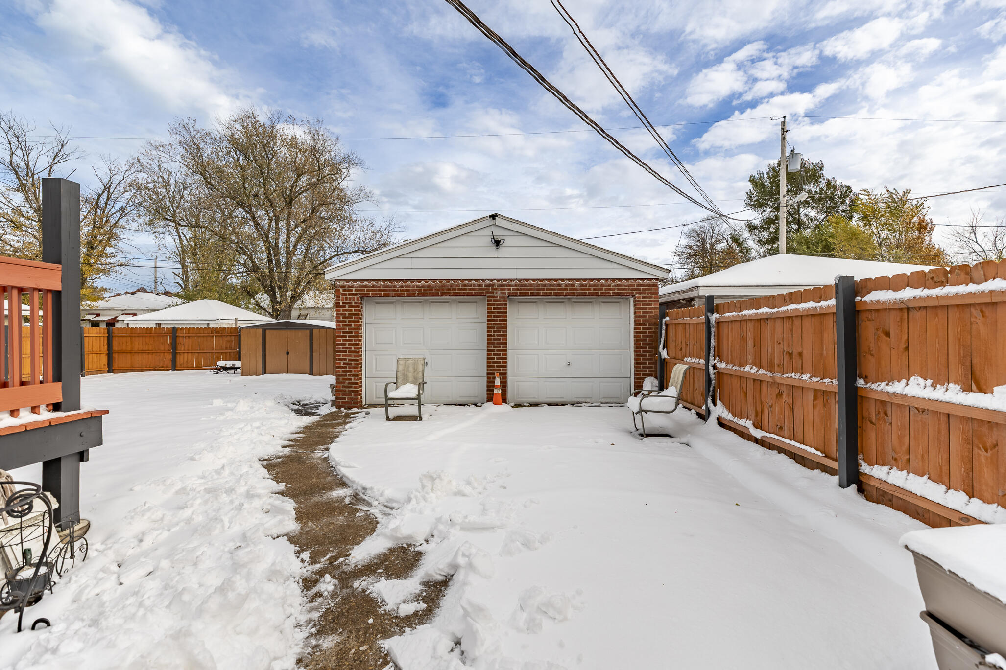 1035 Willard Street Gary, IN 46404 - Photo 6 of 30 a view of a house with a snow in the yard