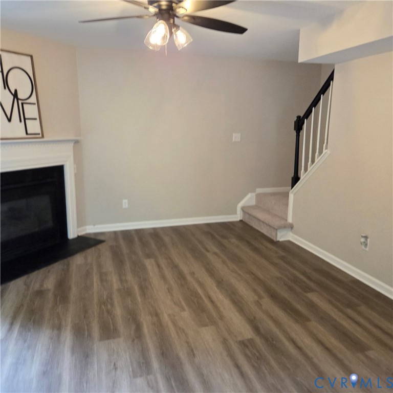 3241 Ransom Hills Road Richmond, VA 23237 - Photo 23 of 24 Wood-finish flooring, fireplace with a white mante