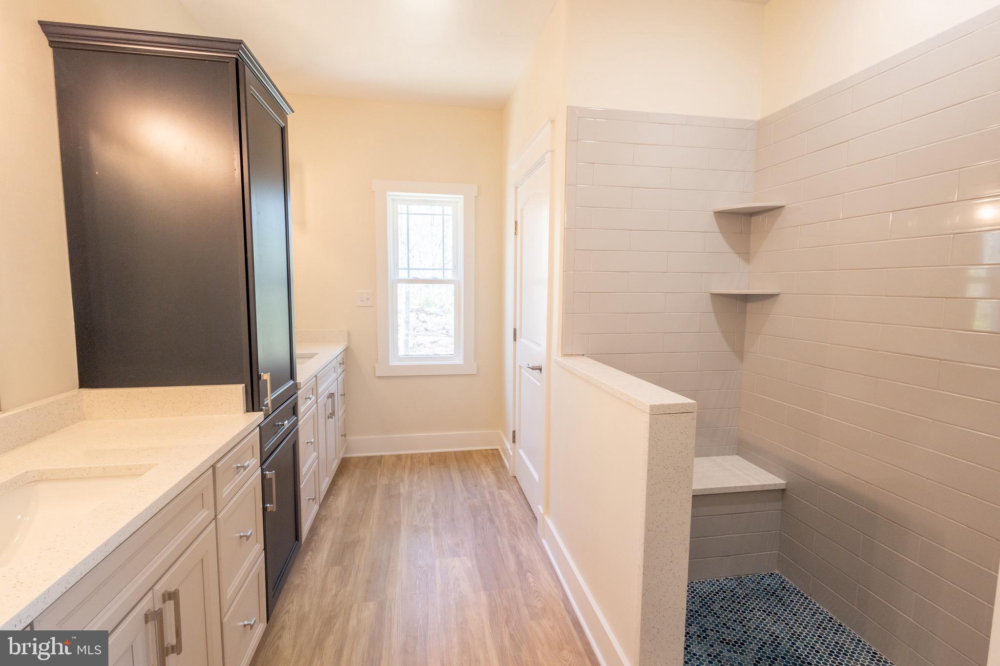 4 Windsor Drive King George, VA 22485 - Photo 22 of 48 a bathroom with a sink and a vanity