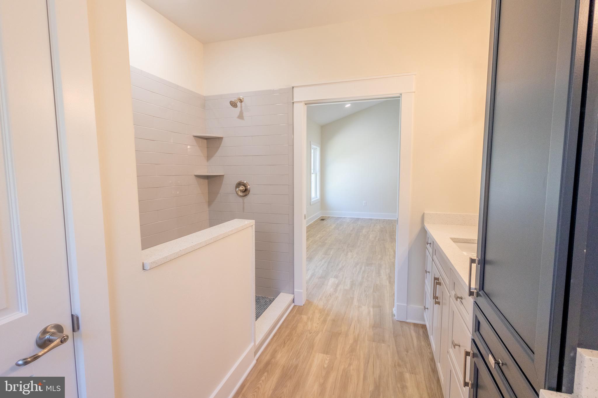 4 Windsor Drive King George, VA 22485 - Photo 24 of 48 a view of a hallway with wooden floor and staircase