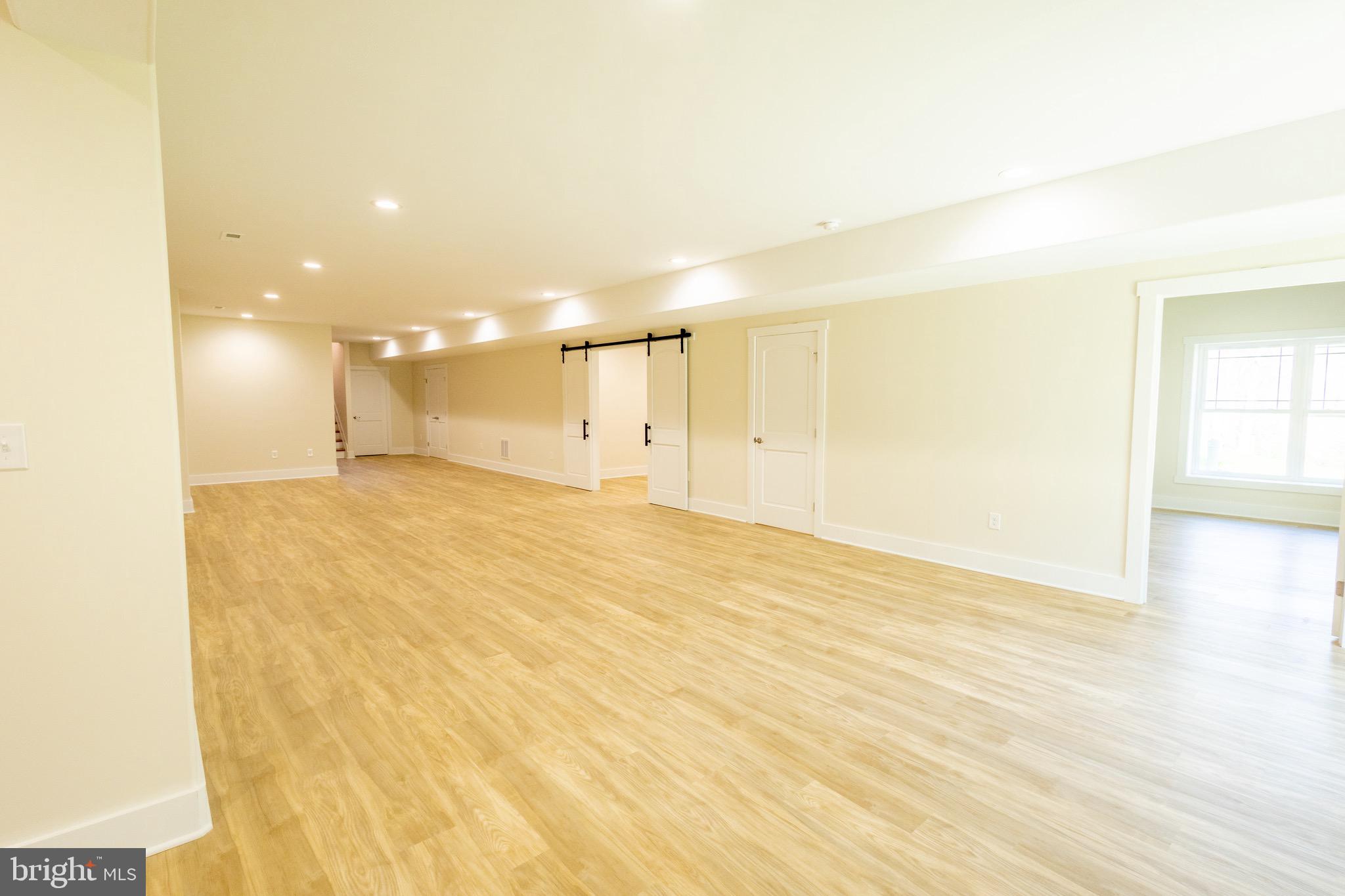 4 Windsor Drive King George, VA 22485 - Photo 41 of 48 a view of empty room with wooden floor