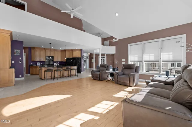 a kitchen with stainless steel appliances granite countertop a sink and a stove