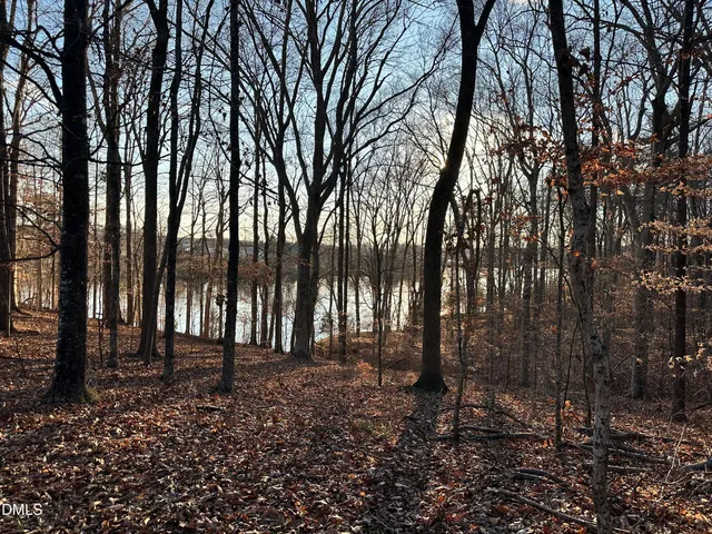 a front view of a house with swimming pool having outdoor seating