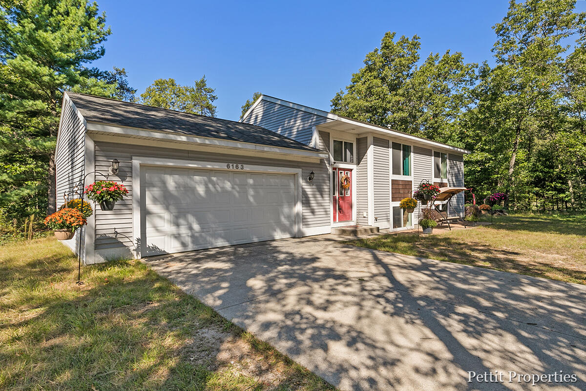 6163 Russell Road Twin Lake, MI 49457 - Photo 2 of 26 IMG_1001
