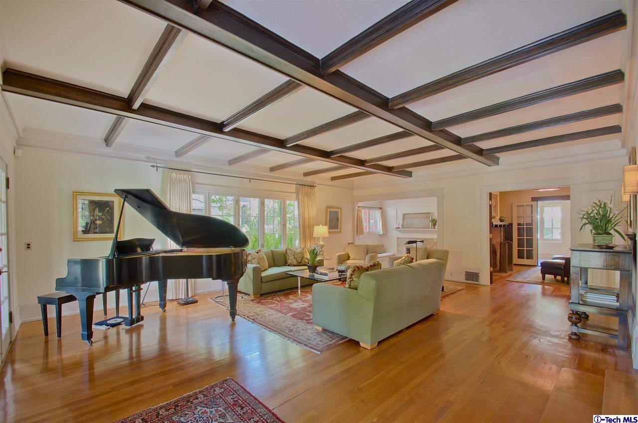 895 South Madison Avenue Pasadena, CA 91106 - Photo 12 of 38 a living room with furniture wooden floor and a table