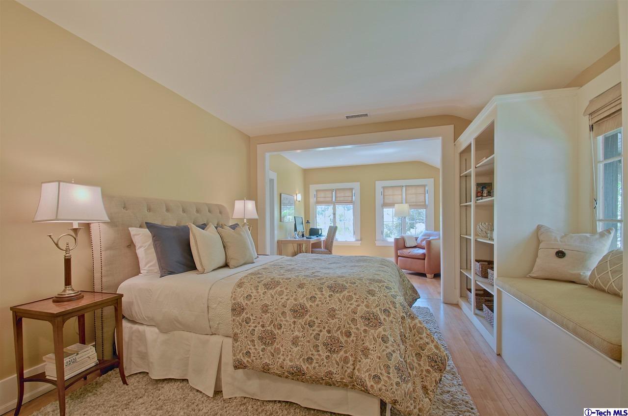 895 South Madison Avenue Pasadena, CA 91106 - Photo 21 of 38 a bed room with a bed and a couch