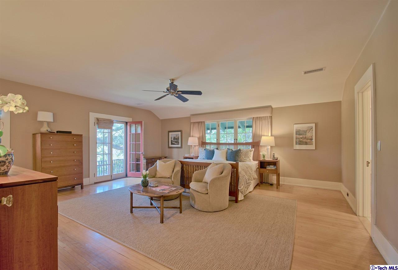 895 South Madison Avenue Pasadena, CA 91106 - Photo 26 of 38 a living room with furniture and a large window