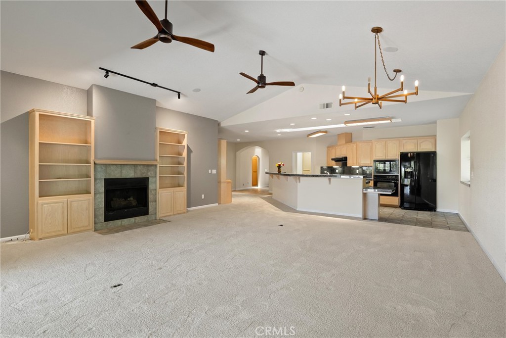 43 Edgewater Court Chico, CA 95928 - Photo 12 of 59 a view of a kitchen with furniture and a fireplace