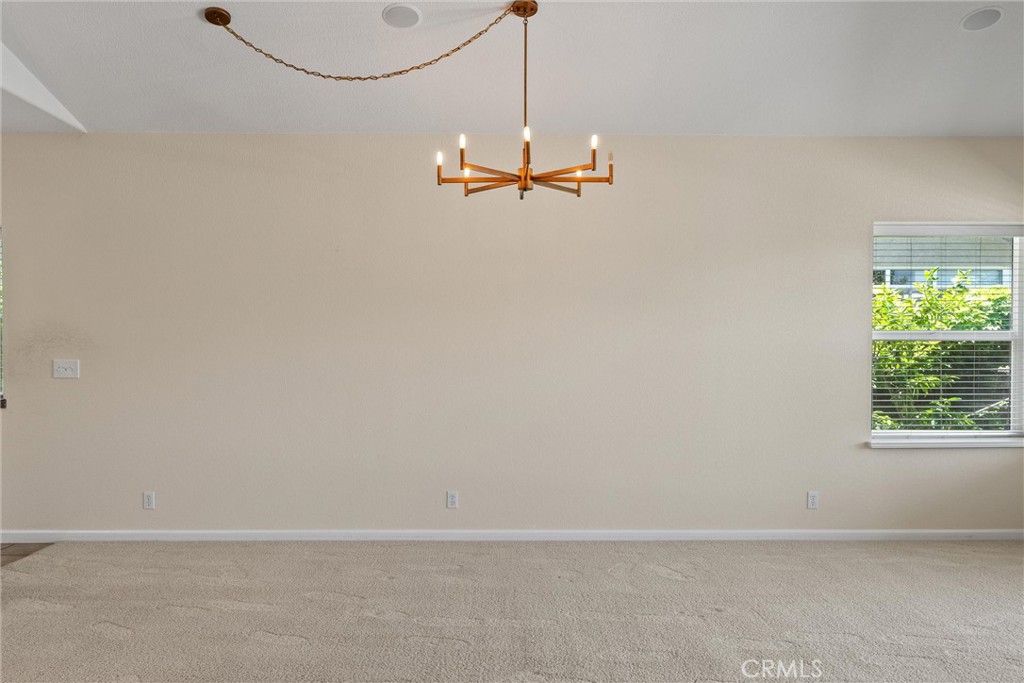 43 Edgewater Court Chico, CA 95928 - Photo 14 of 59 a view of a room with a ceiling fan and window
