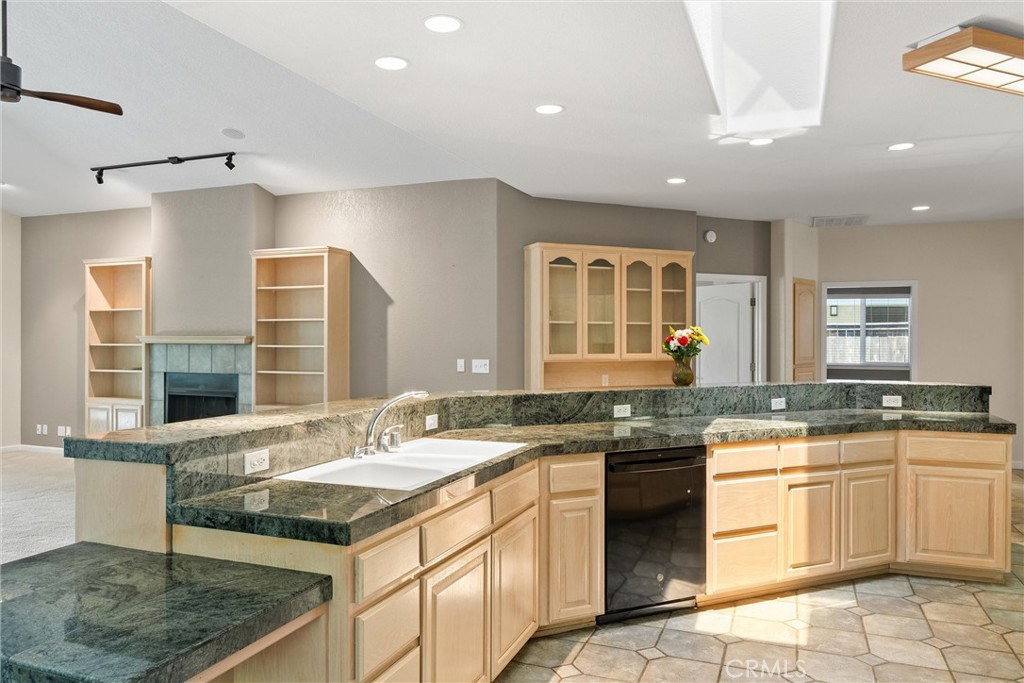 43 Edgewater Court Chico, CA 95928 - Photo 19 of 59 a kitchen with a sink stove and cabinets