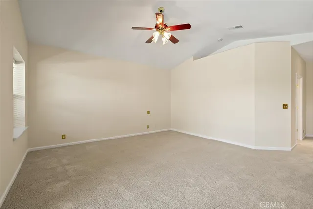 a bathroom with a double vanity sink and mirror with window