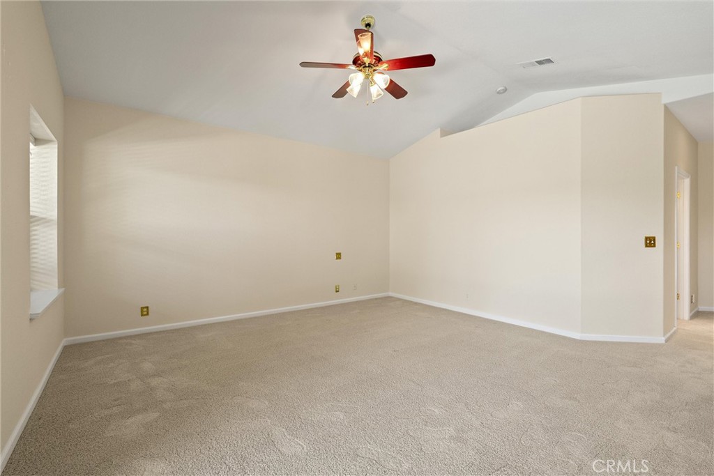 43 Edgewater Court Chico, CA 95928 - Photo 26 of 59 an empty room with closet and a chandelier fan