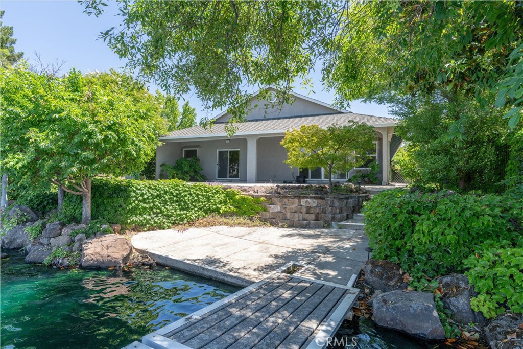 43 Edgewater Court Chico, CA 95928 - Photo 45 of 59 a front view of a house with a yard