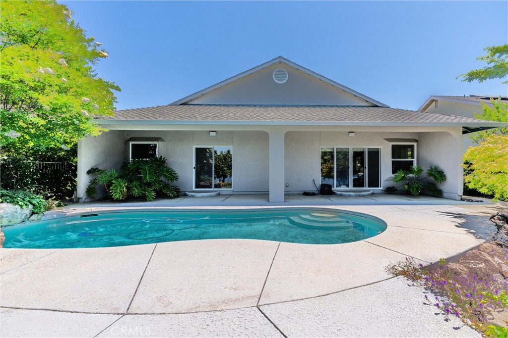 43 Edgewater Court Chico, CA 95928 - Photo 46 of 59 a front view of a house with a garden