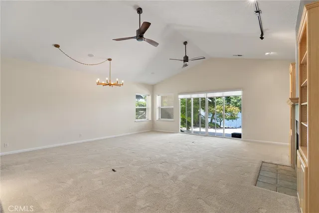 a view of a kitchen with furniture and a fireplace