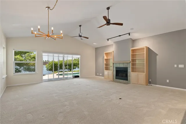 a view of a kitchen with a sink and a window