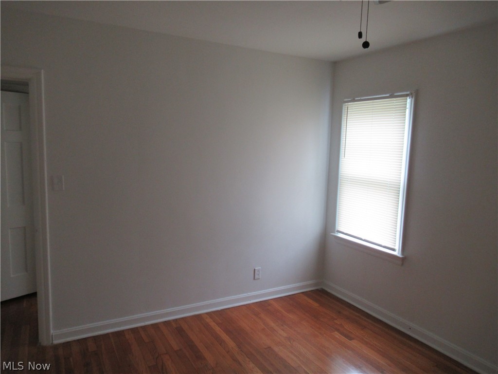 3824 East Antisdale Road Cleveland, OH 44118 - Photo 19 of 27 Warm wood-finish flooring complemented by white trim and a neutral wall palette