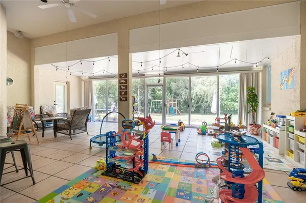 a very nice looking living room with a large window