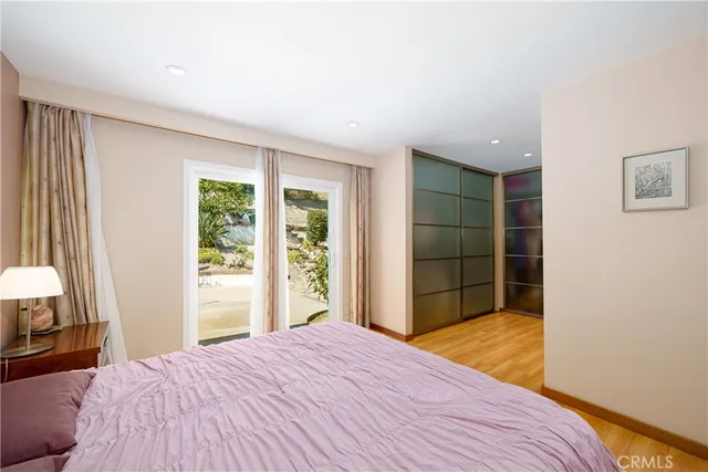 a bathroom with a tub shower vanity and a sink