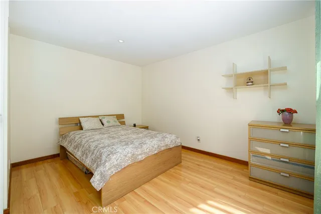 a view of patio with a table and chairs and potted plants