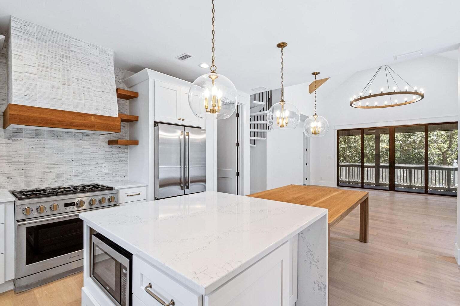 18 Seabreeze Place Seacrest, FL 32461 - Photo 11 of 41 a kitchen with a stove a sink and a refrigerator