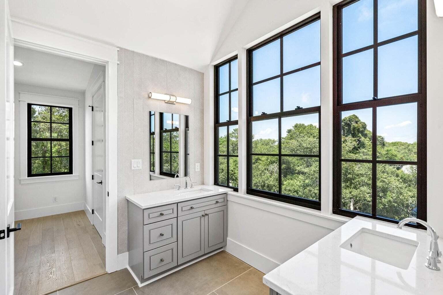 18 Seabreeze Place Seacrest, FL 32461 - Photo 19 of 41 a bathroom with a tub sink and window