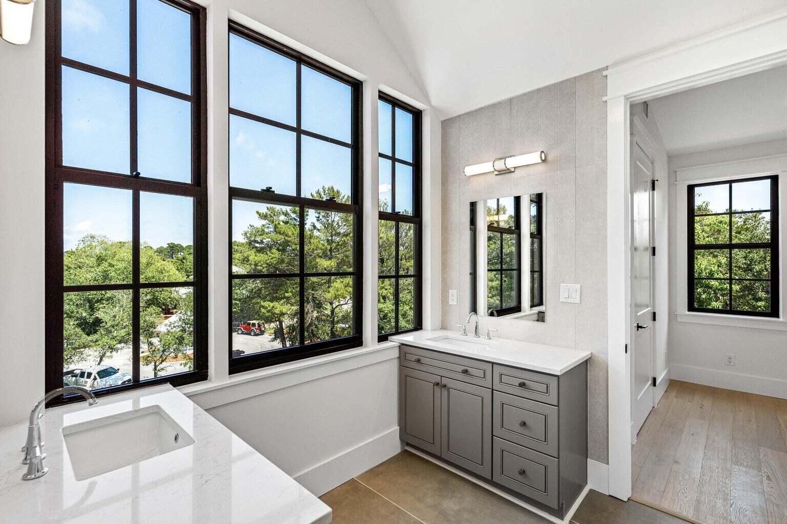 18 Seabreeze Place Seacrest, FL 32461 - Photo 20 of 41 a bathroom with a tub a sink and large window