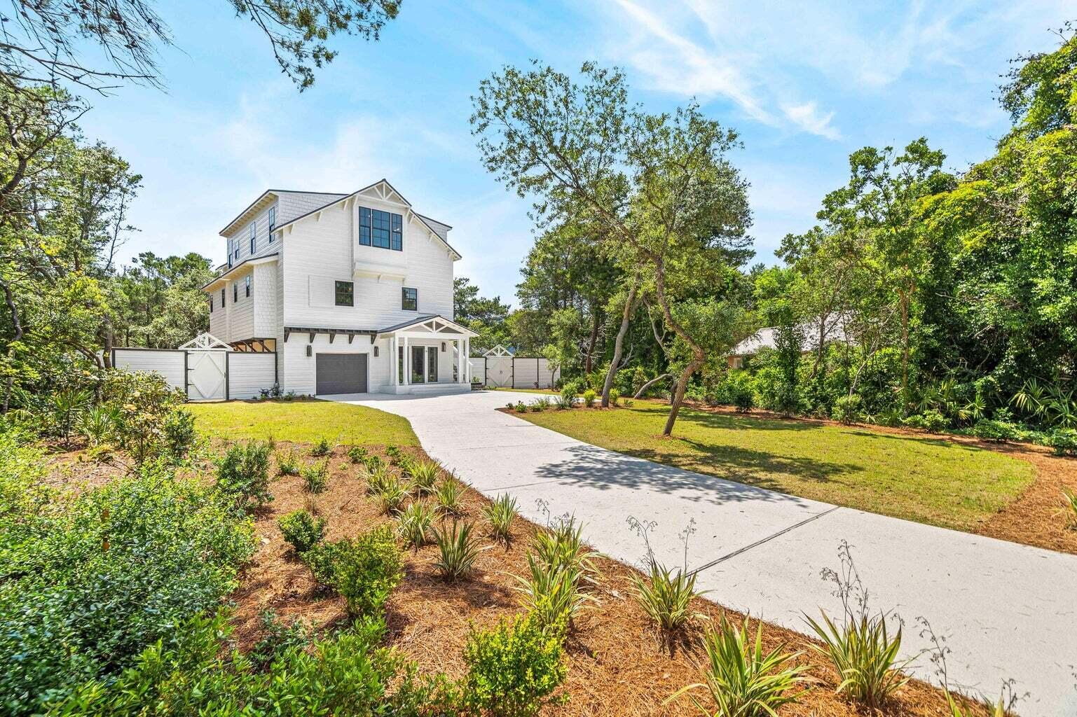 18 Seabreeze Place Seacrest, FL 32461 - Photo 2 of 41 a view of house with swimming pool and a yard