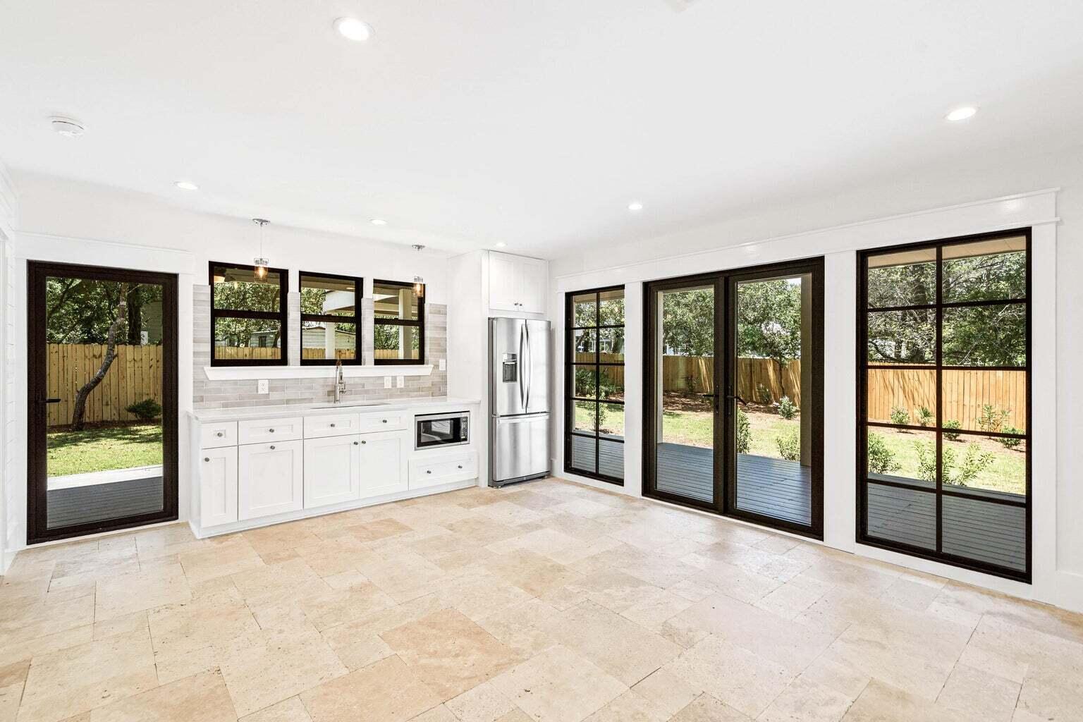 18 Seabreeze Place Seacrest, FL 32461 - Photo 21 of 41 a large white room with a large window and a bed