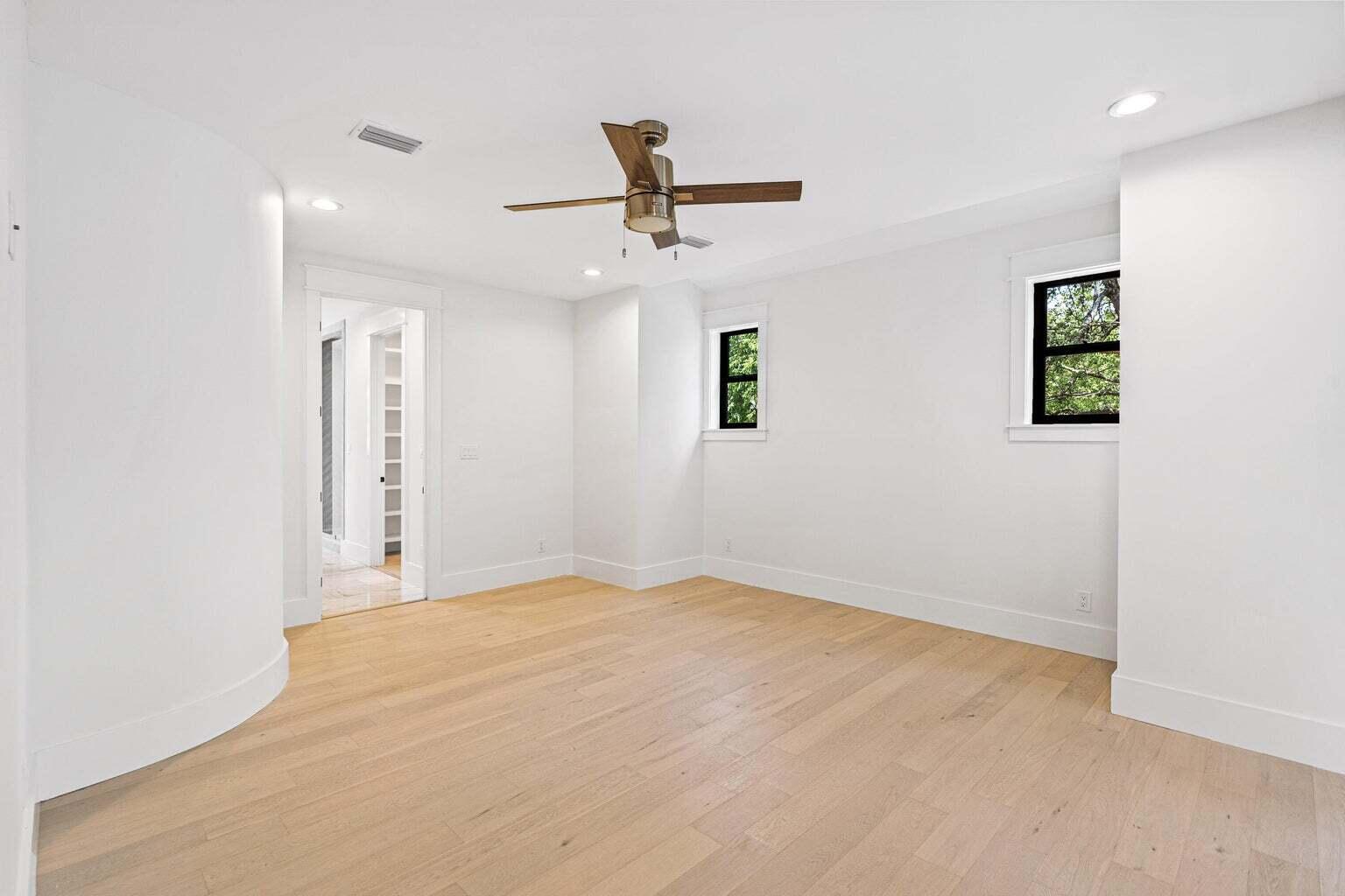 18 Seabreeze Place Seacrest, FL 32461 - Photo 22 of 41 an empty room with a ceiling fan and window