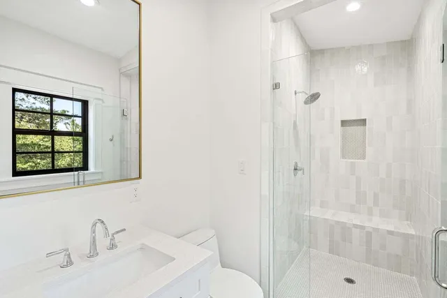 a bathroom with a sink and a shower